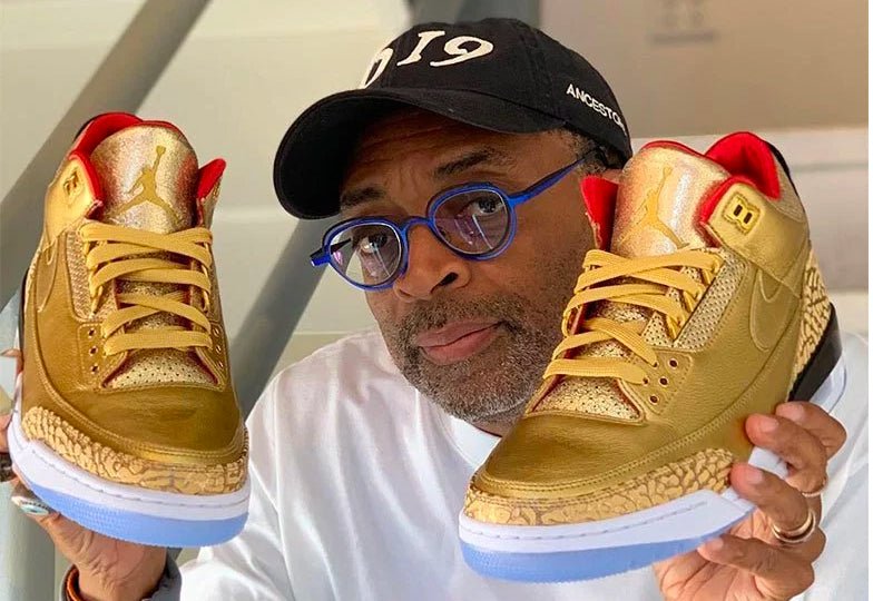 Spike Lee Shows Off A Pair of Gold Air Jordan 3 Tinker for Oscars - Sneaker Tees to match Air Jordan Sneakers
